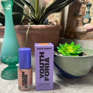 Youthforia in RADIANT Sun-kissed Skin Enhancer Liquid highlighter
